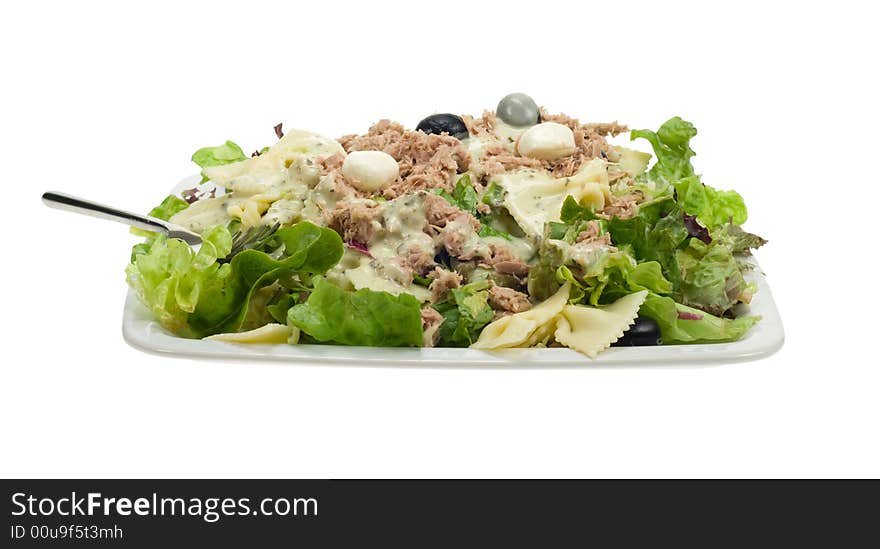 Fresh tunafish salad isolated on a white background