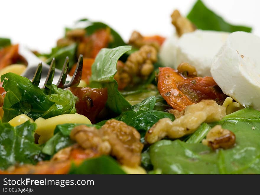 Fresh and healthy salad isolated on a white background