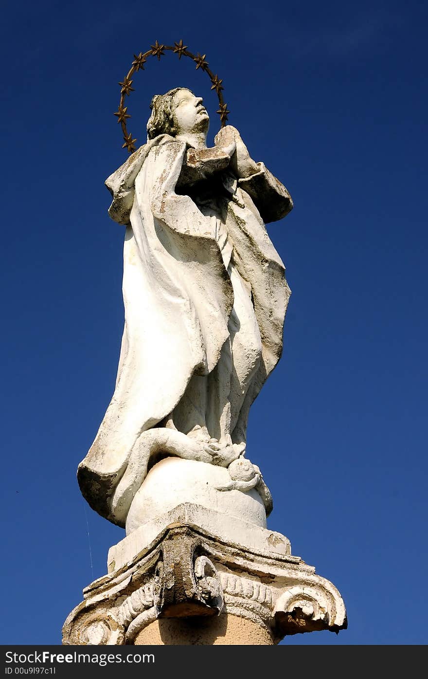 Holy Mother statue over a blue sky. Holy Mother statue over a blue sky