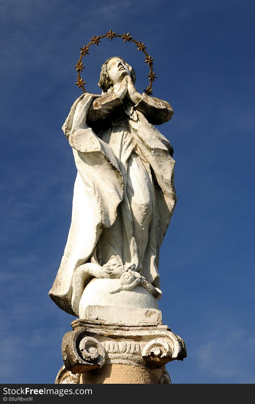 Holy Mother statue over a blue sky. Holy Mother statue over a blue sky