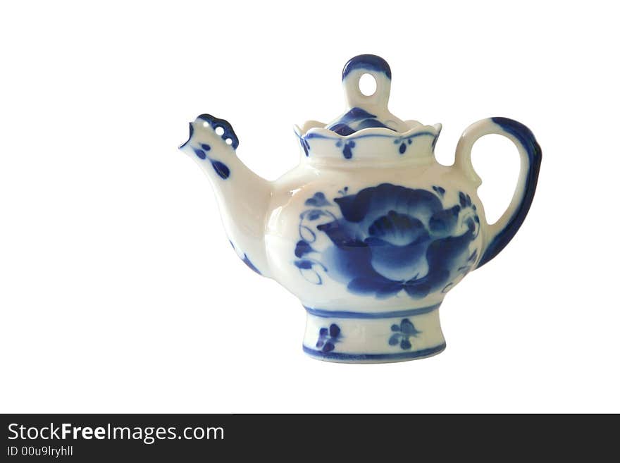 Teapot with blue ornaments.