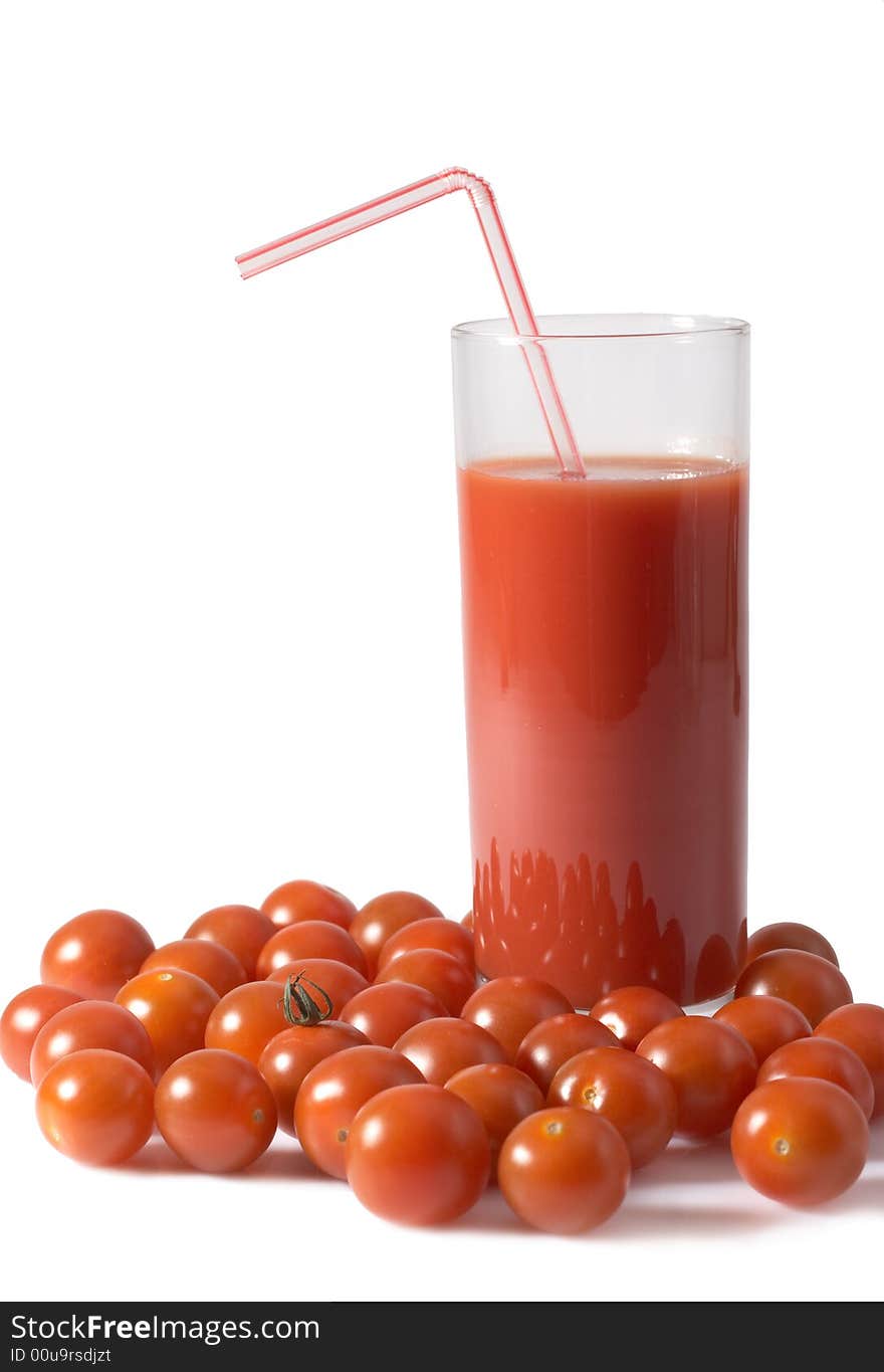 Tomatoes and juice on a white background