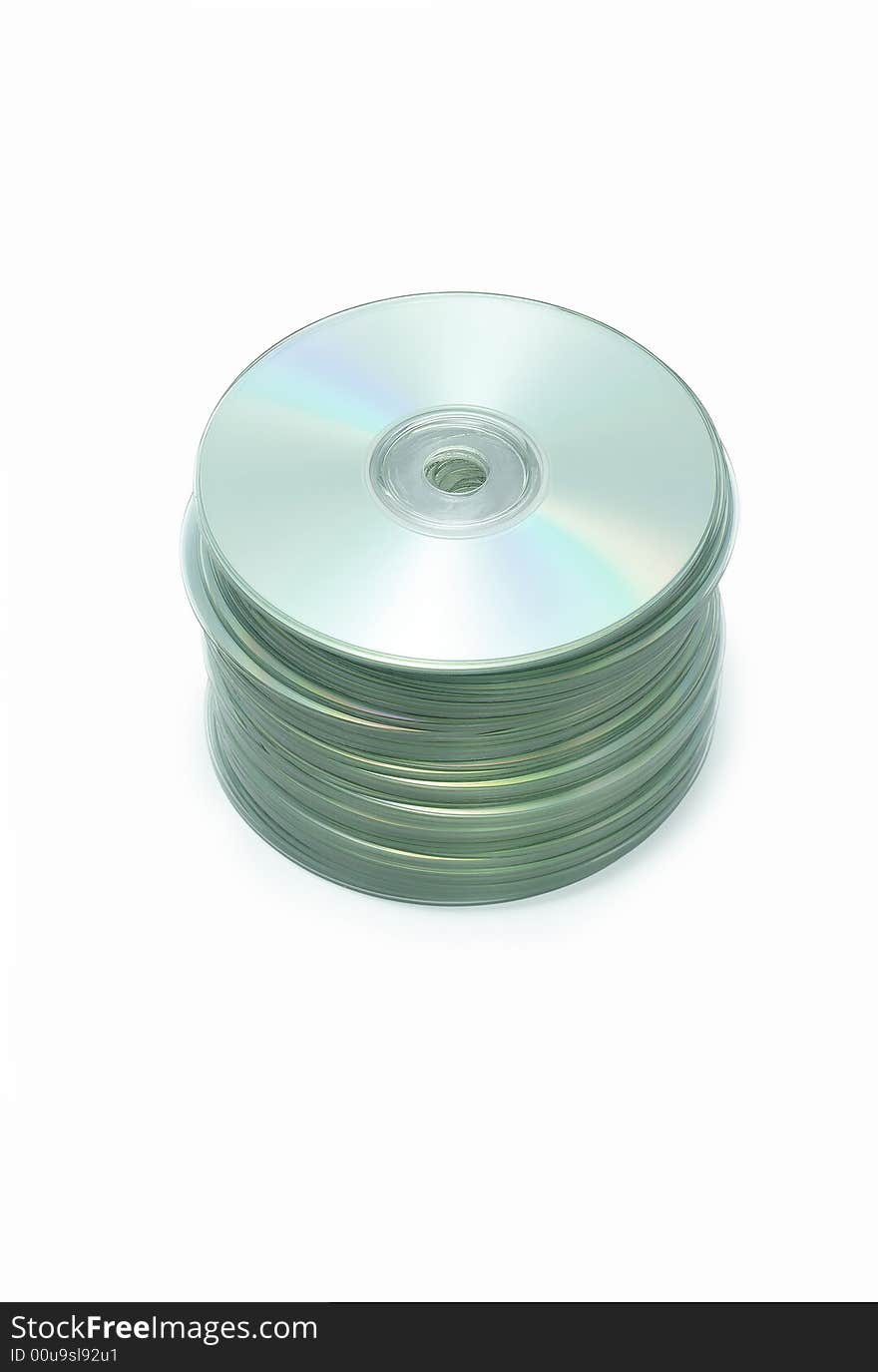 Tall neat stack of CD disks on white background