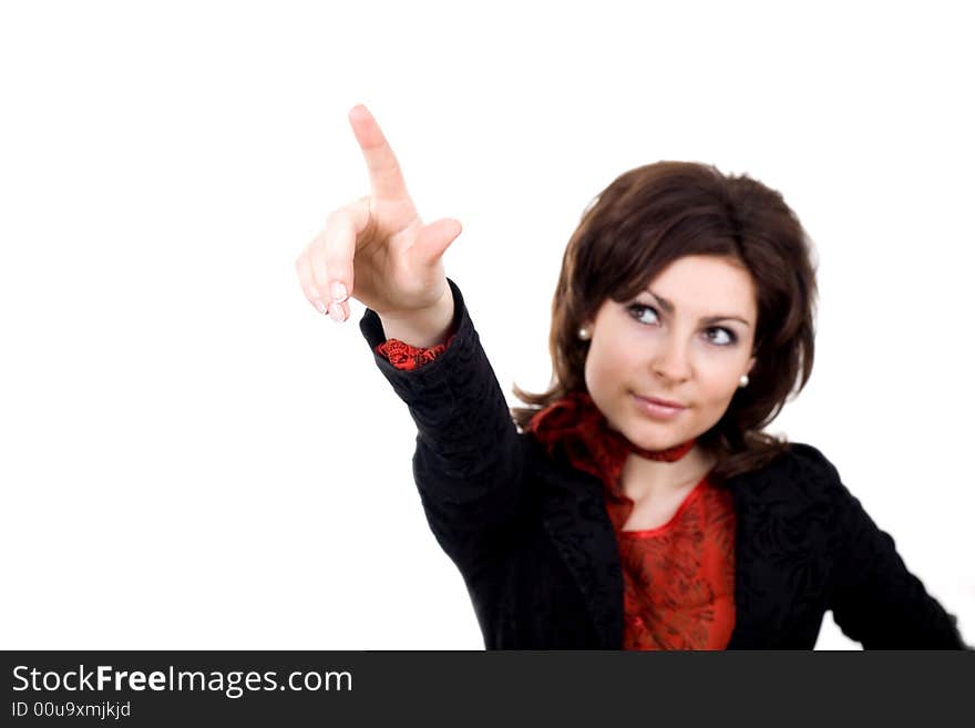 A woman printing something her hand with her finger up