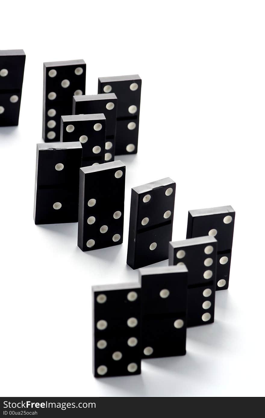 Dominoes isolated in dark background