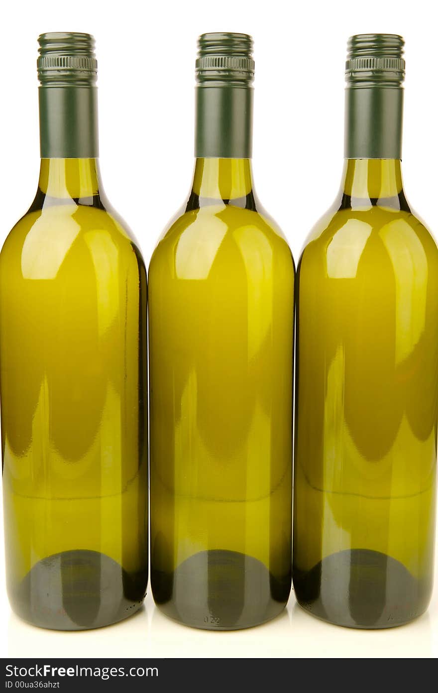 White wine bottles isolated against a white background