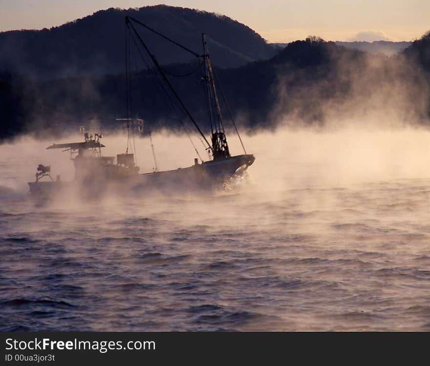 Early morning sail from a port. Early morning sail from a port