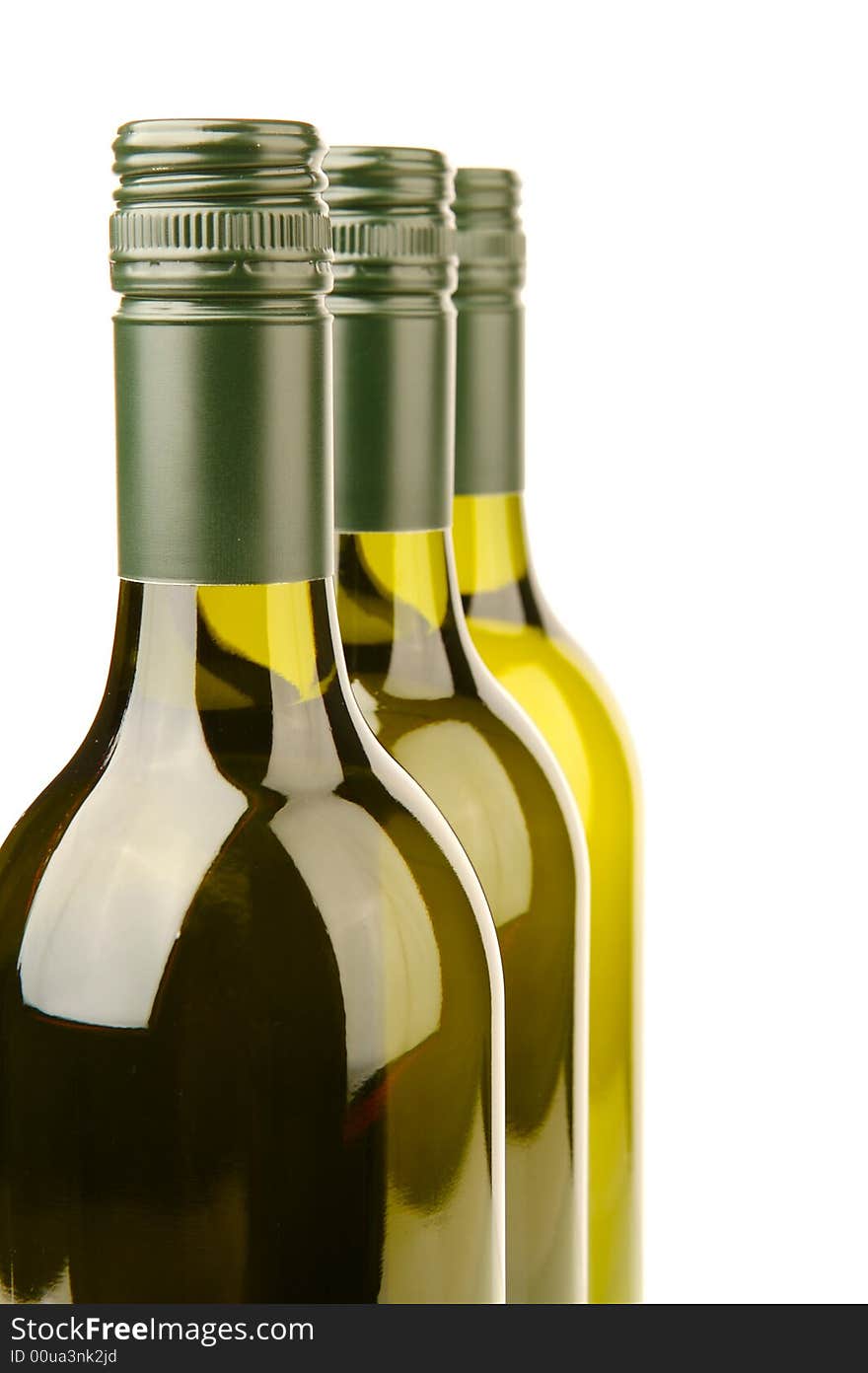 White wine bottles isolated against a white background