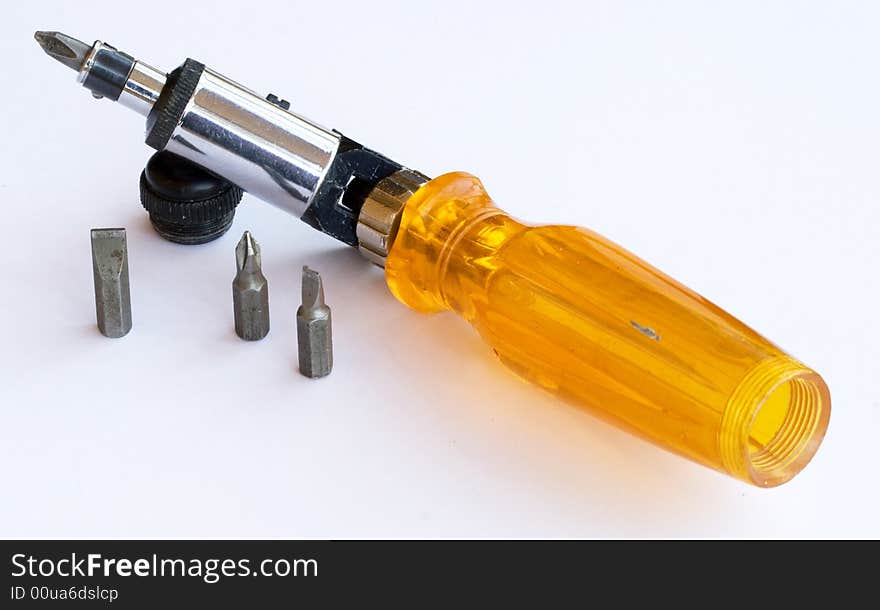 A multiple screwdriver on white background