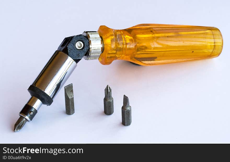 A multiple screwdriver on white background