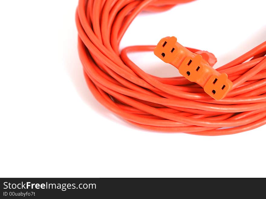 A 100 foot orange extension cord coiled up with a three way splitter