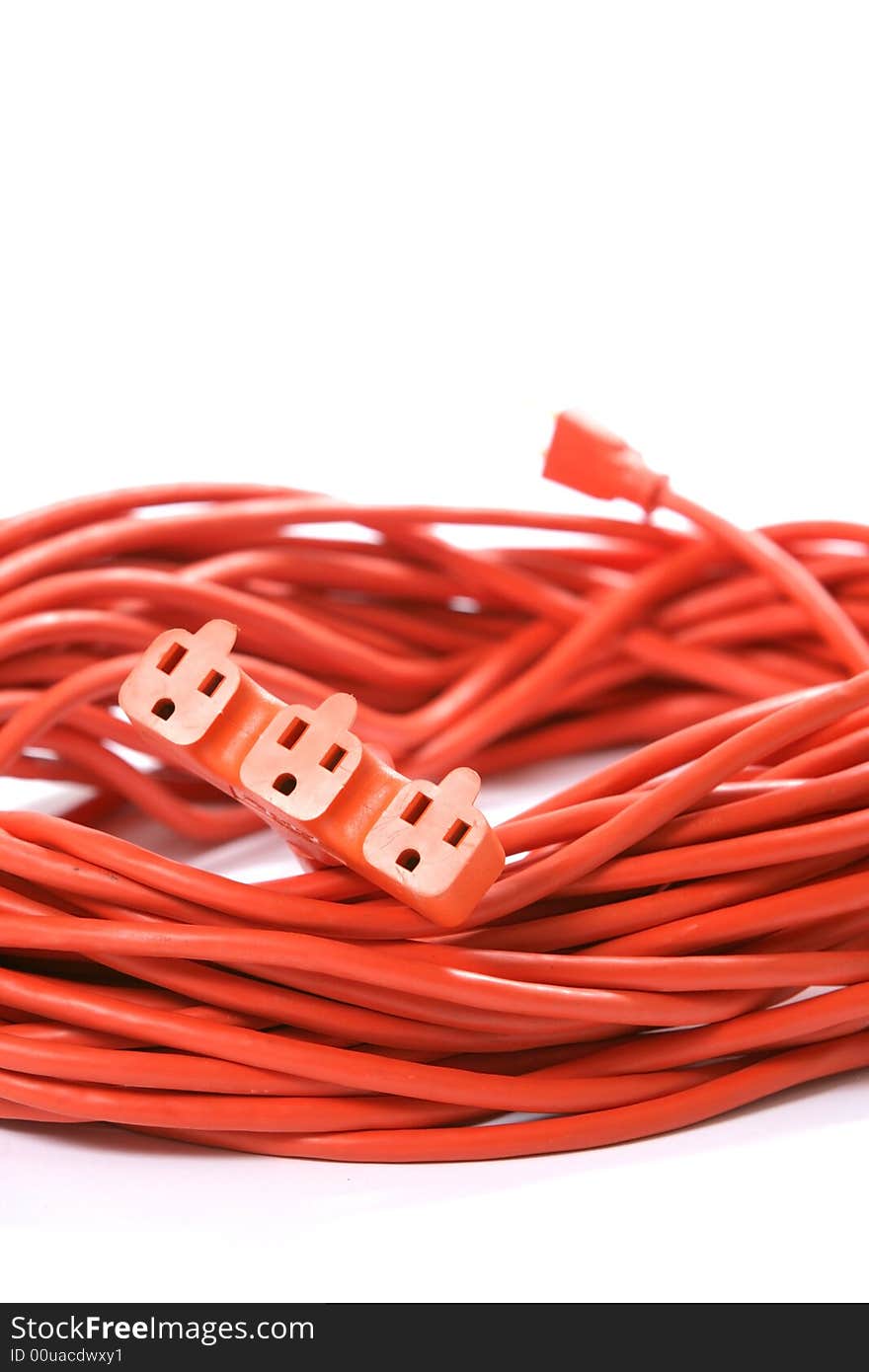 A 100 foot orange extension cord coiled up with a three way splitter