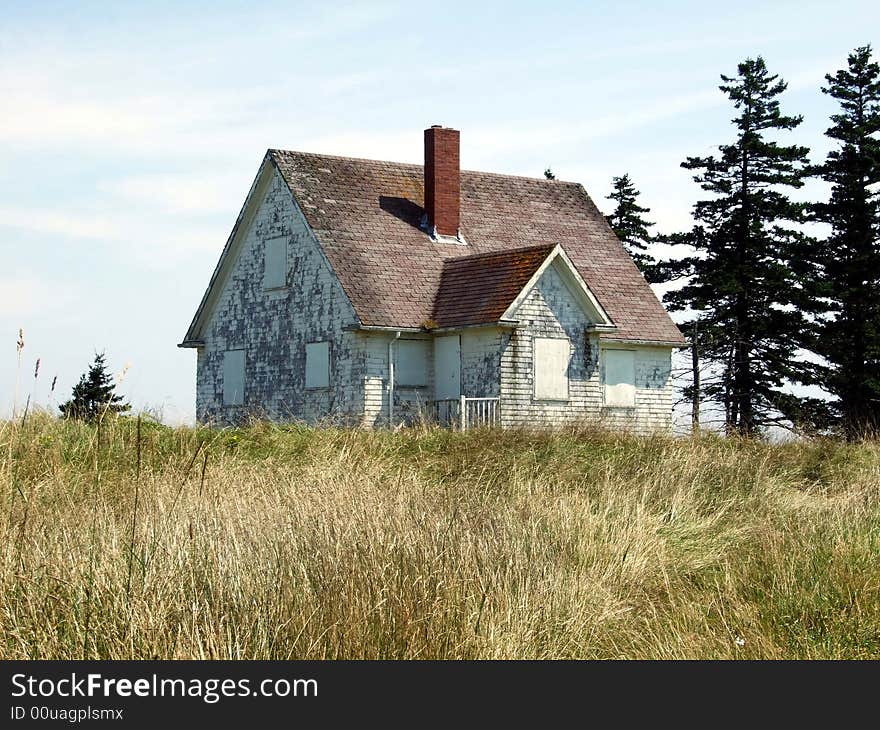 Old abandoned boarded up house, on Moshers Island Lighthouse Lahave Lunenburg County Nova Scotia Canada. Old abandoned boarded up house, on Moshers Island Lighthouse Lahave Lunenburg County Nova Scotia Canada