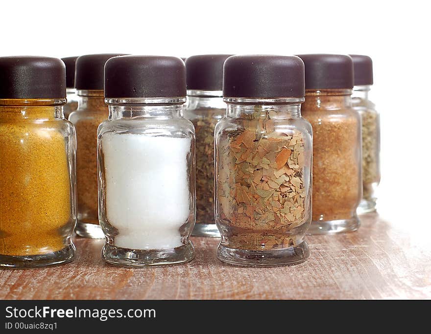 Variety of spices in bottles high resolution image