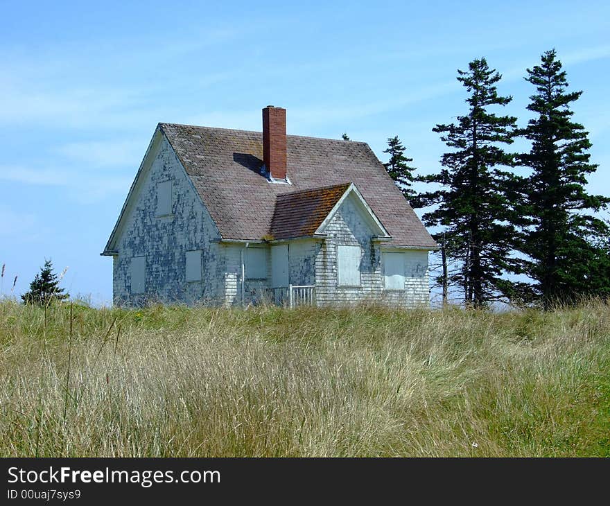 Old abandoned boarded up house, on Moshers Island Lighthouse Lahave Lunenburg County Nova Scotia Canada. Old abandoned boarded up house, on Moshers Island Lighthouse Lahave Lunenburg County Nova Scotia Canada