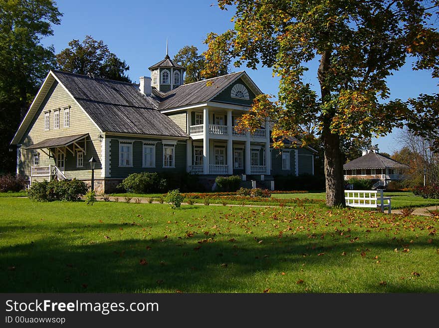 Manor in the autumn sunny day.