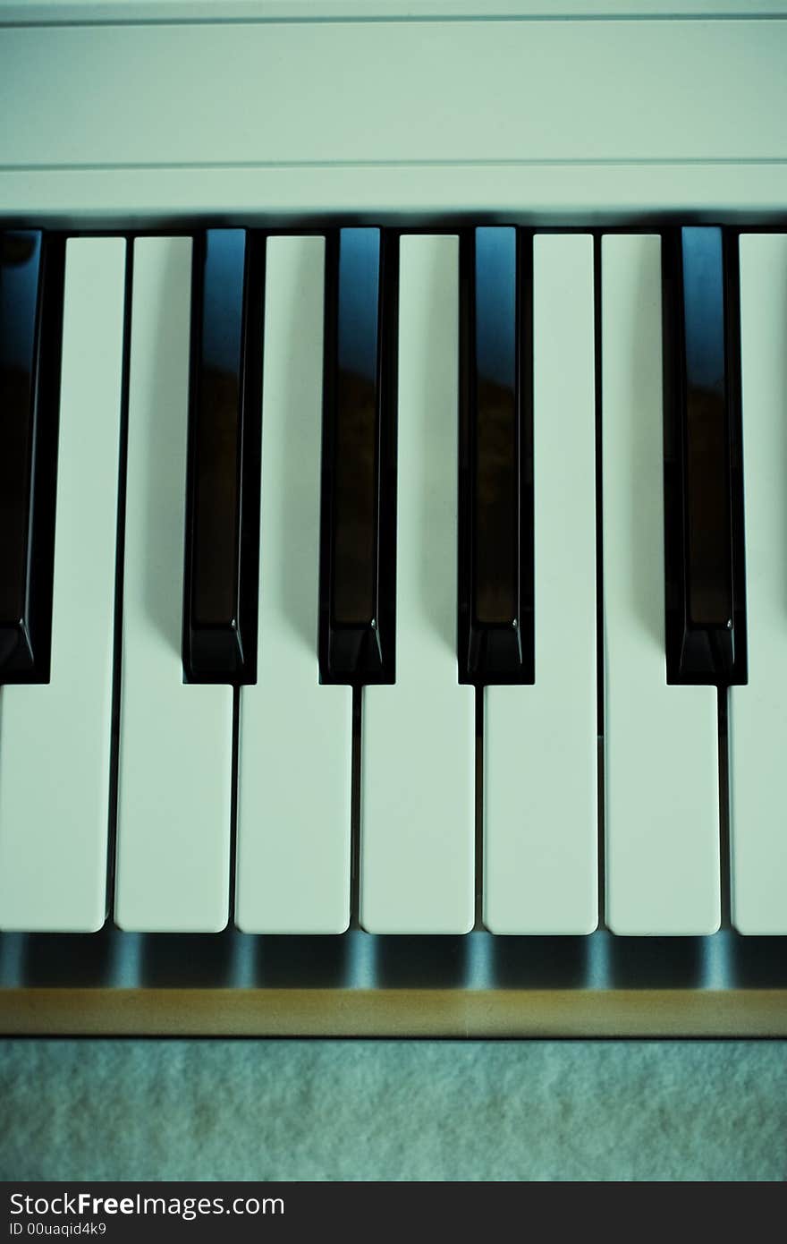 View of a fragment of a keyboard from an electronic synthesizer. View of a fragment of a keyboard from an electronic synthesizer.