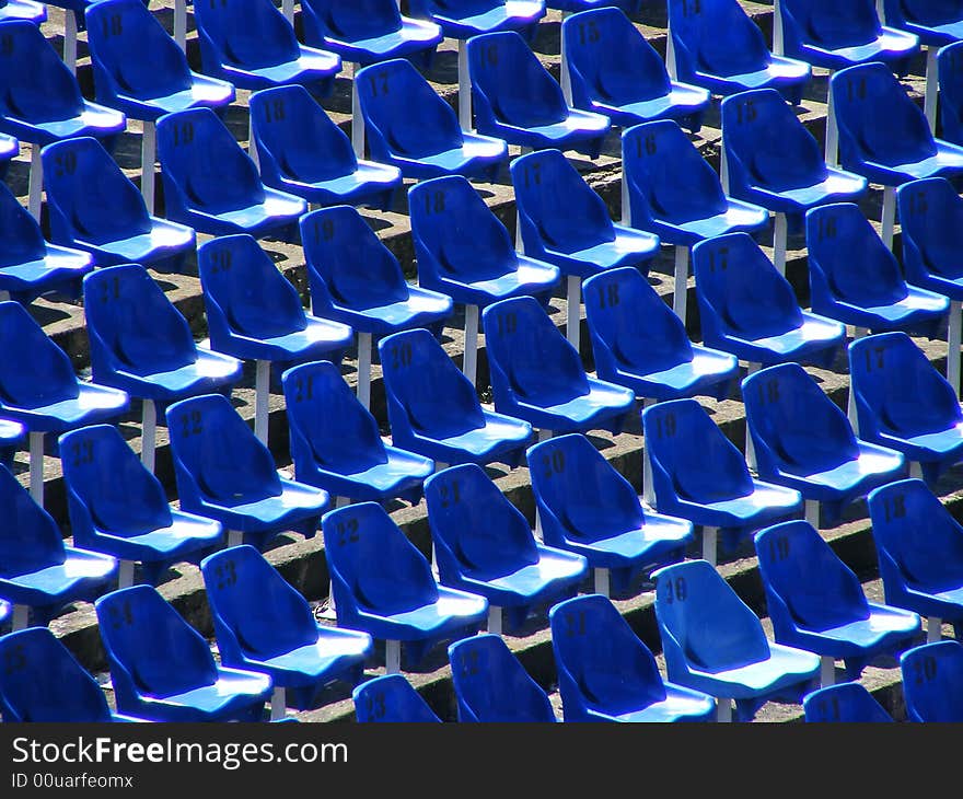 Rows of the blue sits waiting for people