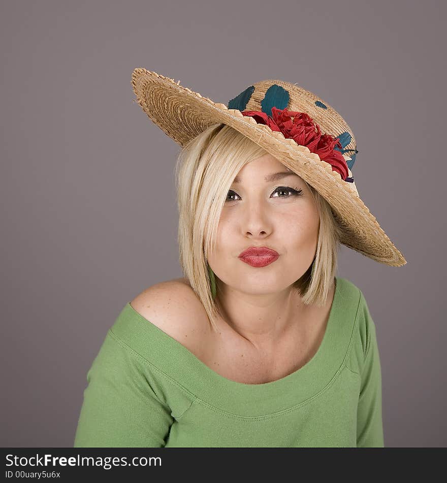 Flowered Hat Puckering Lips