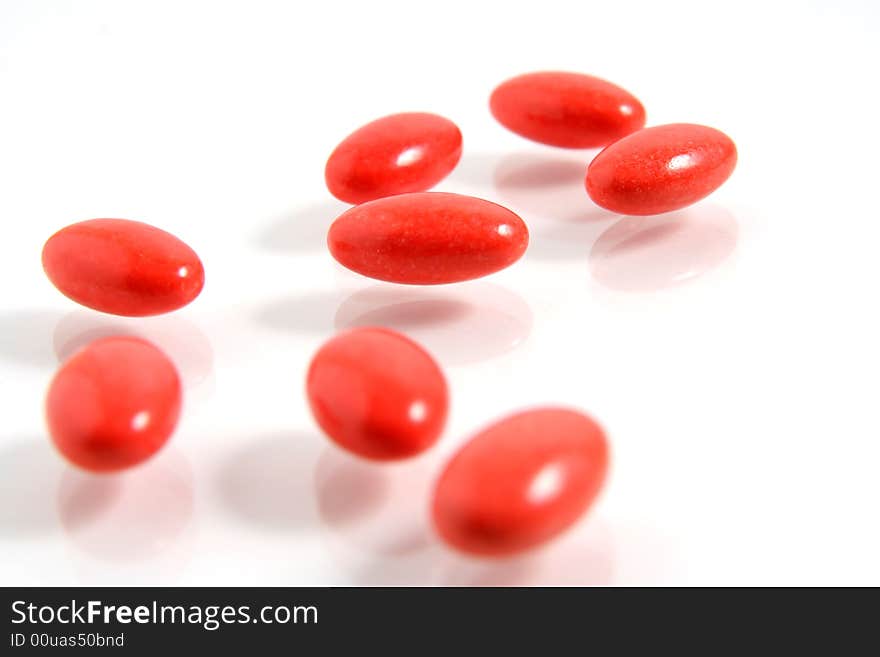 A few medicine tablets on a table