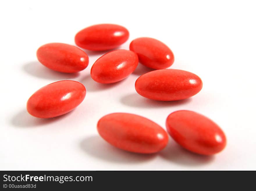 A few medicine tablets on a table