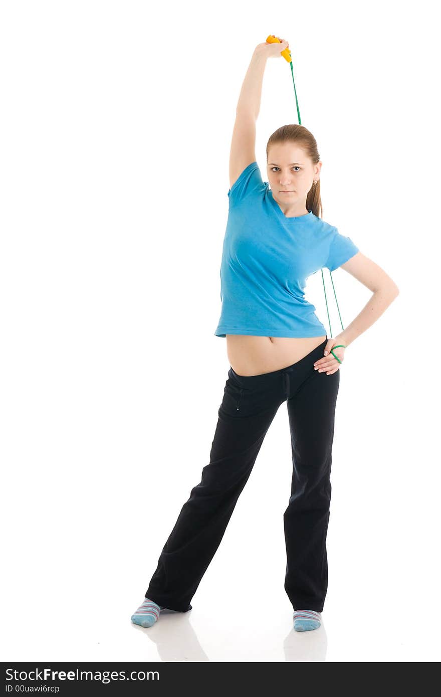 The young woman with the skipping rope isolated on a white background