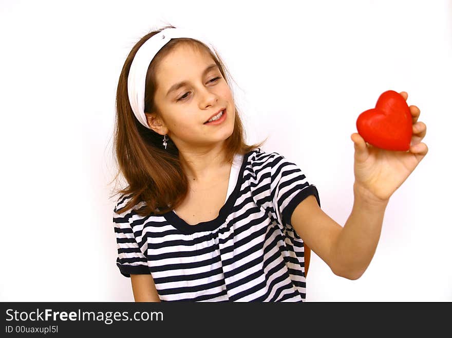 Little girl  holding a valentine heart