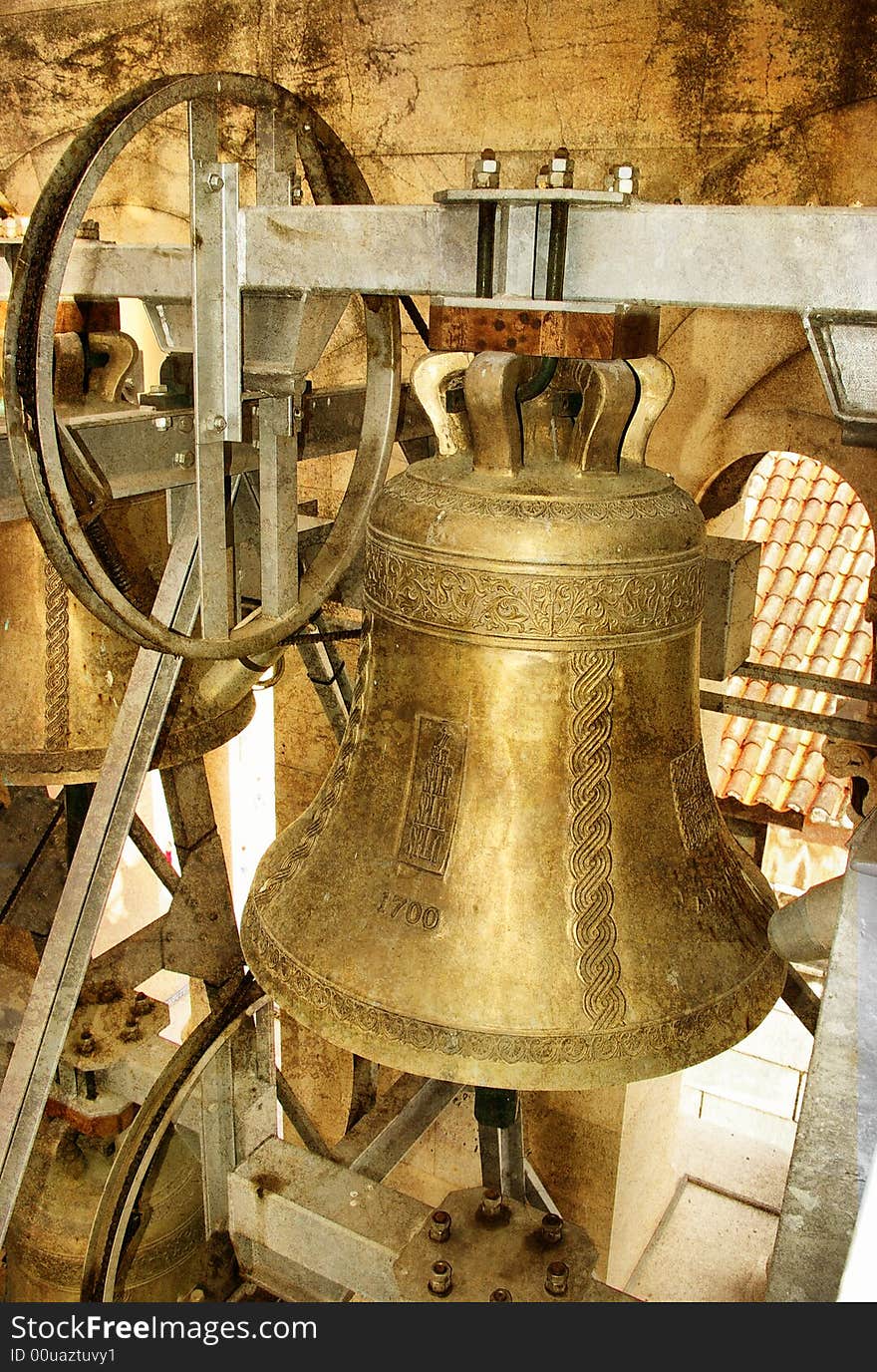 Bell in ancient cathedral - toned picture in retro style. Bell in ancient cathedral - toned picture in retro style