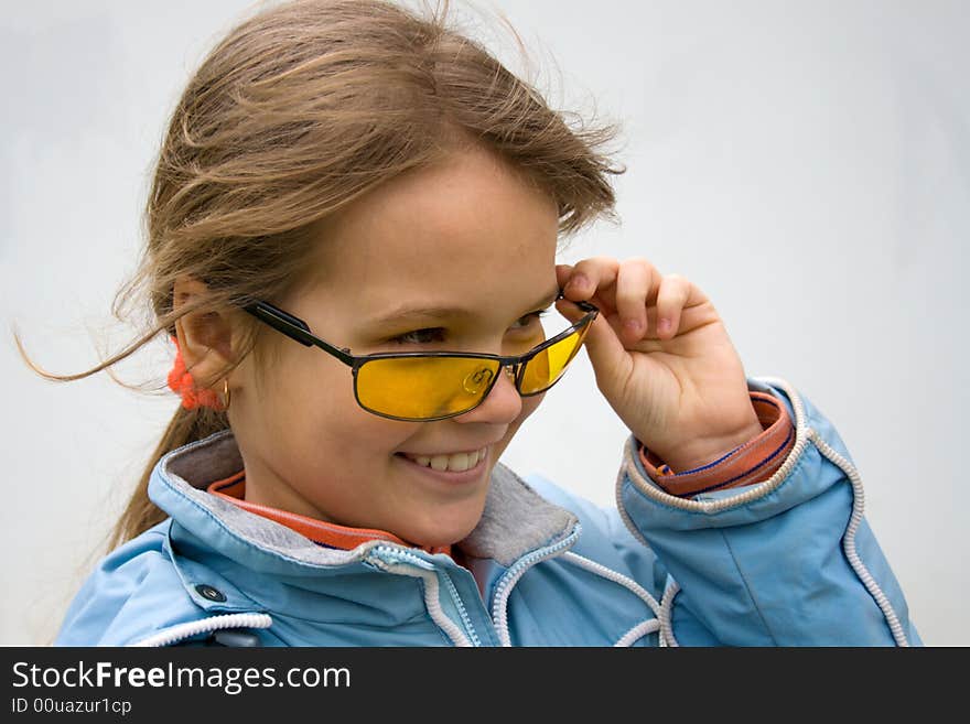 The young girl looks over points. The young girl looks over points