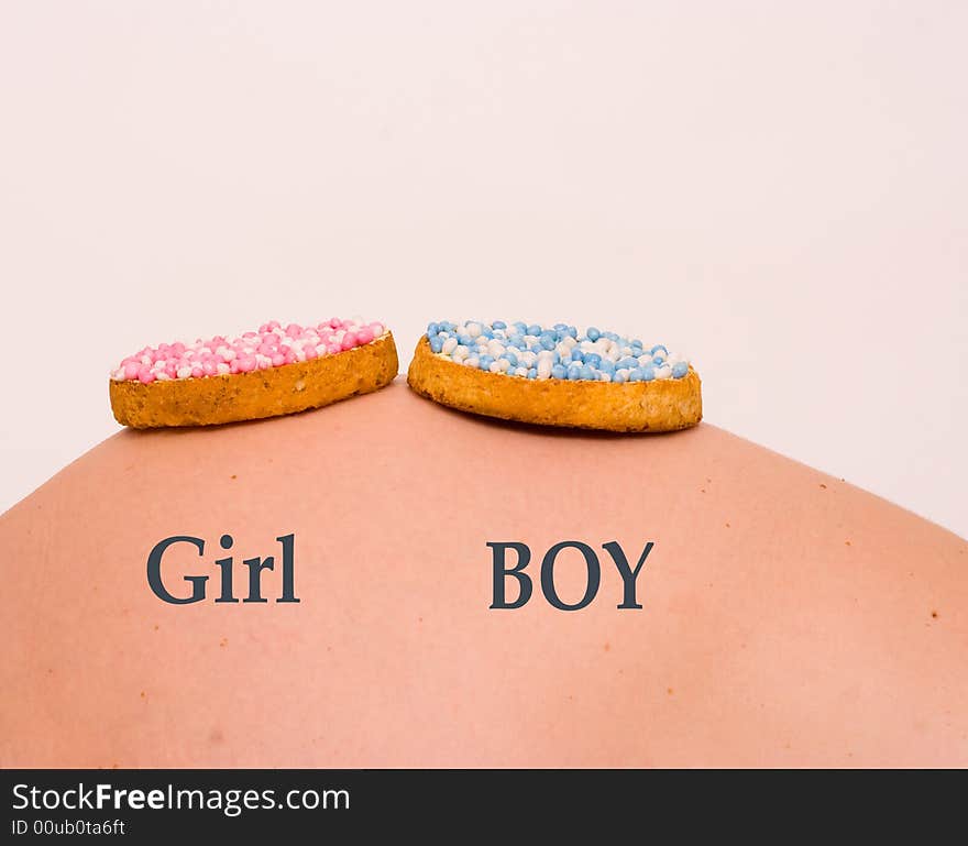 2 biscuits on belly. Is it a boy or girl. 2 biscuits on belly. Is it a boy or girl