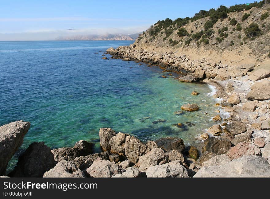 A sea and rocks is a beautiful coastline