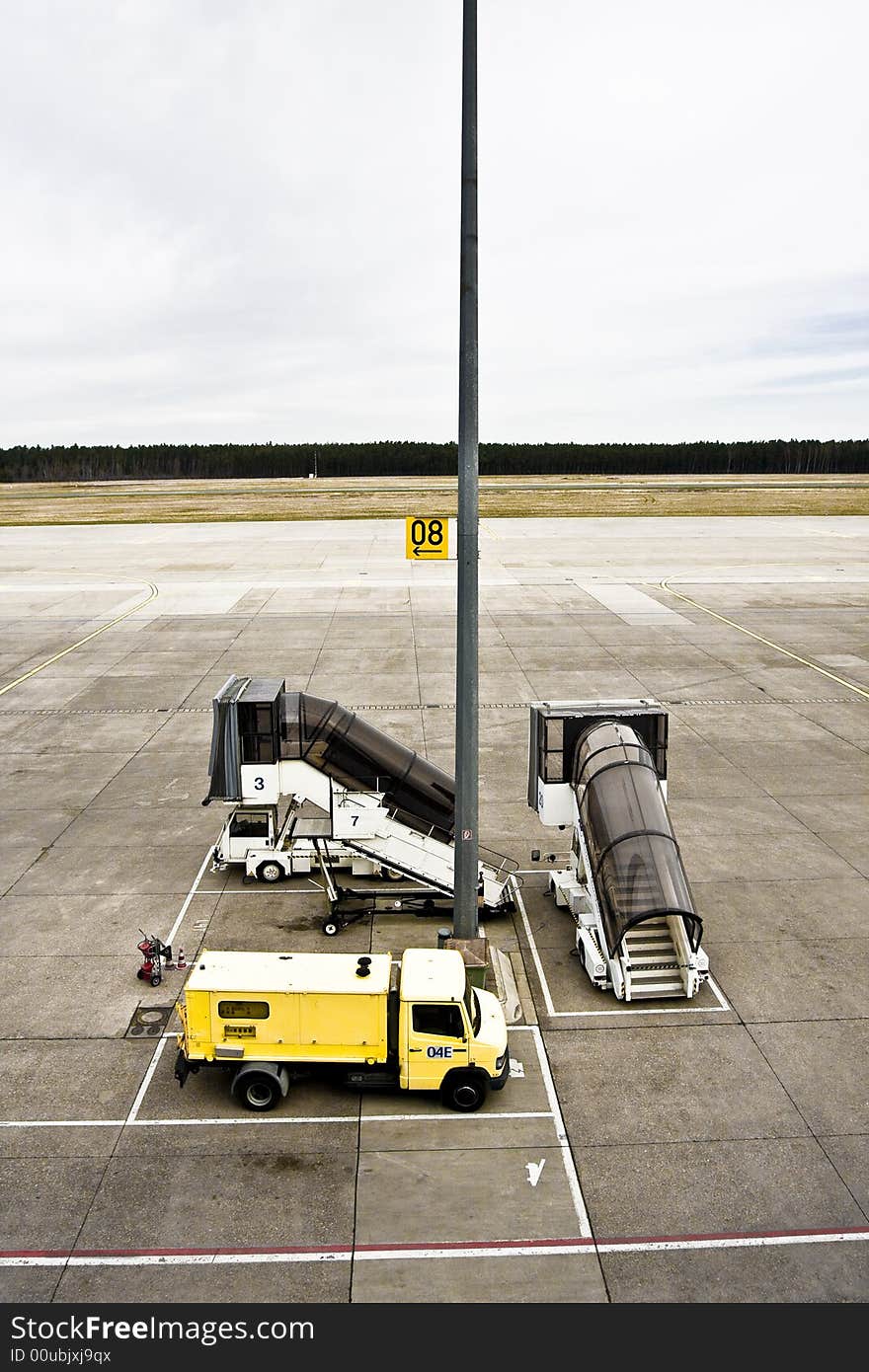 Runway with vehicles