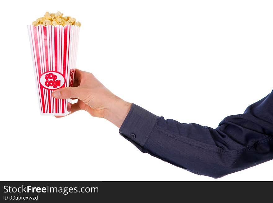 Man giving some popcorn at a movie. Man giving some popcorn at a movie