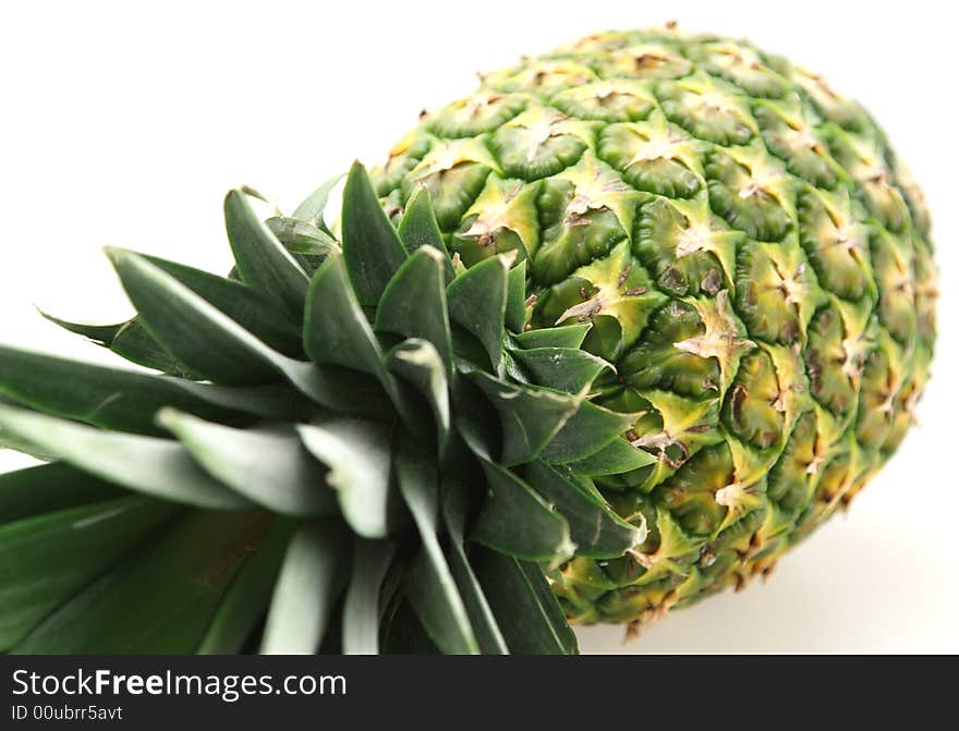 Fresh pineapple ready to be sliced for desert or salad