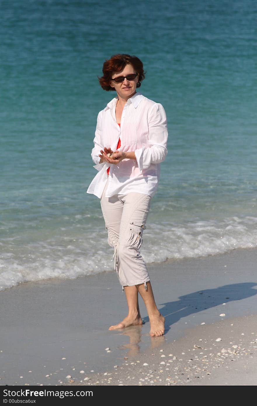 Girl Collecting Sea Shells