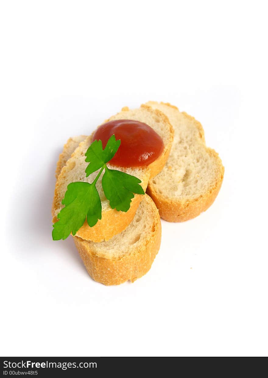 Isolated Toasts with ketchup and parsley