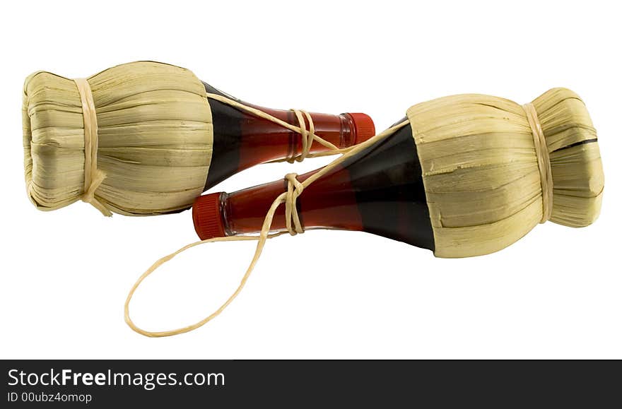 Two bottles of red wine isolated on white