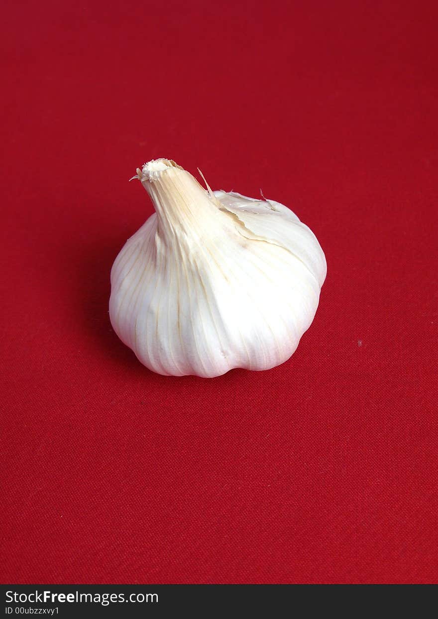 Garlic in a red background