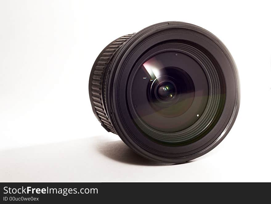 SLR camera lens on white isolated background