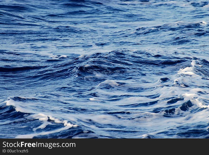 Murky water - disturbed waves at sea. Murky water - disturbed waves at sea