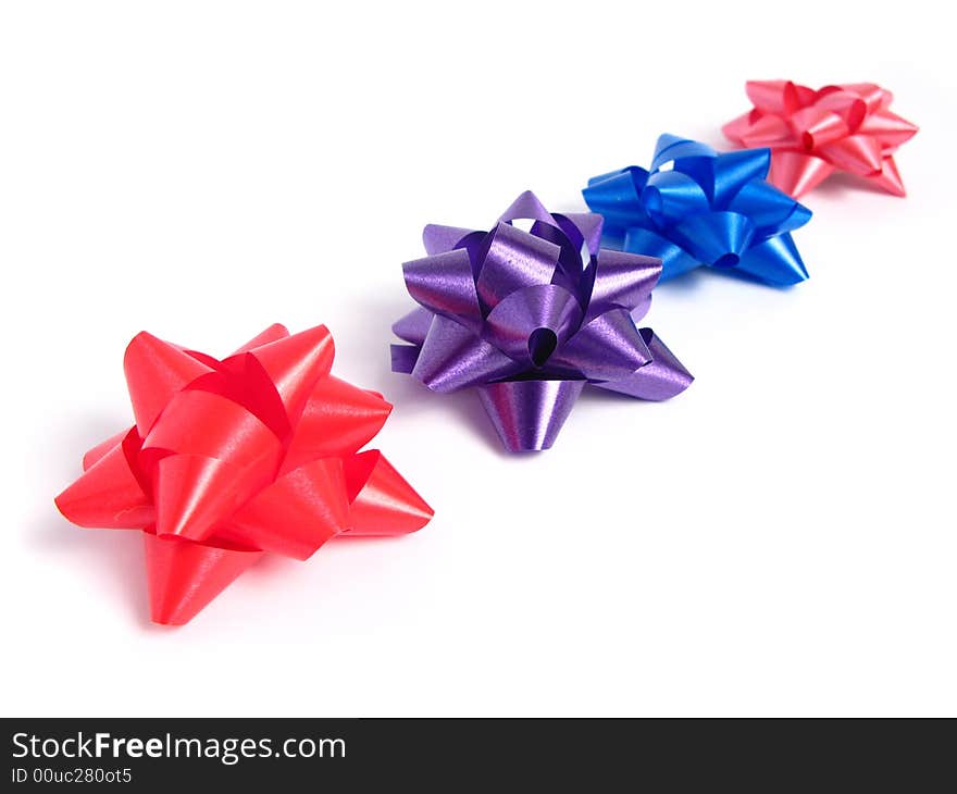 Four colorful gift Bows in white background. Four colorful gift Bows in white background.