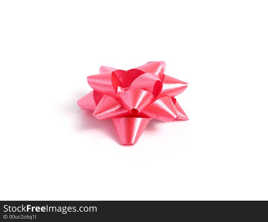 Pink gift Bow in white background.