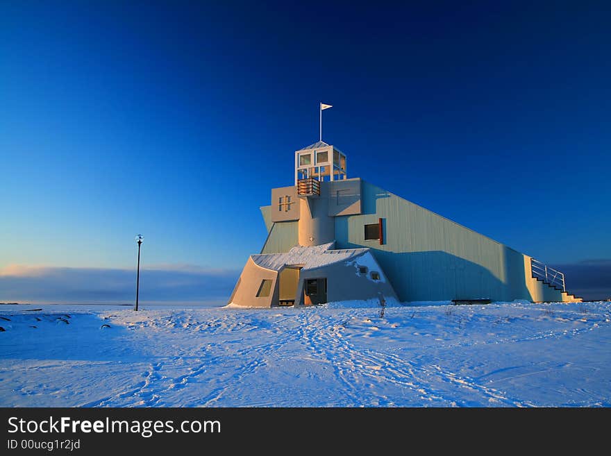 Building on sea shore in winter