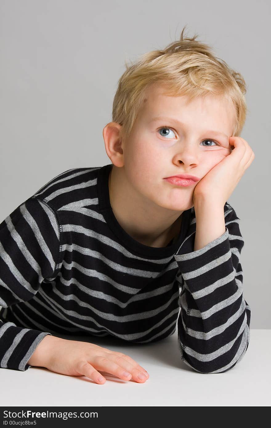 Portrait of a thinking little boy