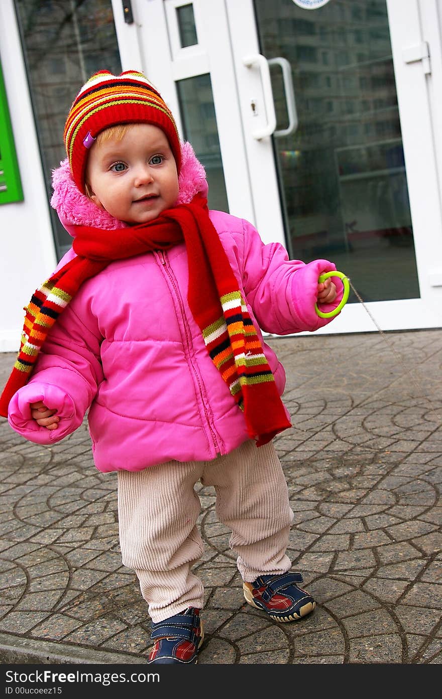 Girl walks near the shop