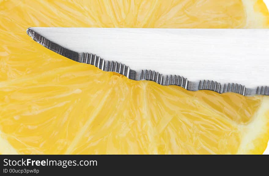 Knife with lemon close up