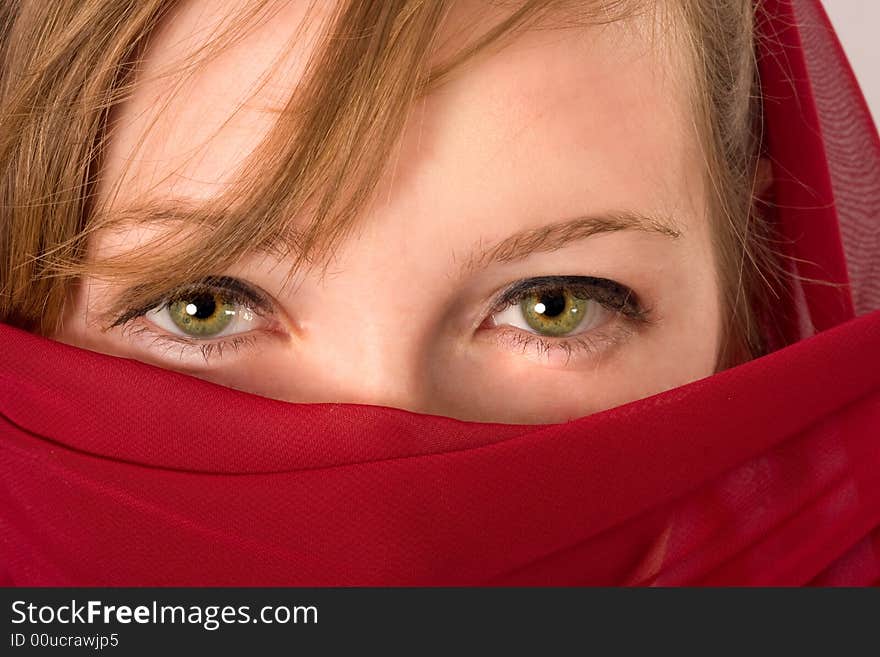 Woman with red paranja eyes