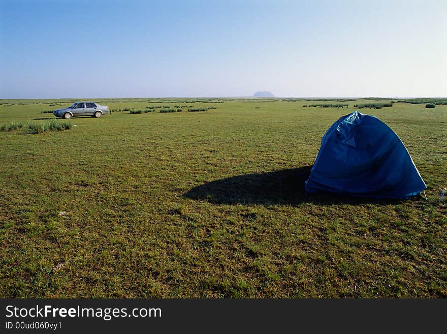 Blue tent and car