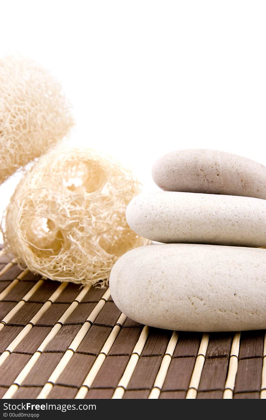 Natural organic sponge and spa stones isolated