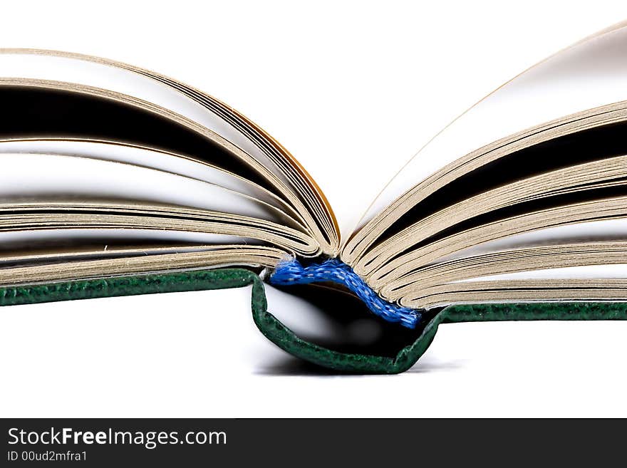 Open old book isolated on the white background